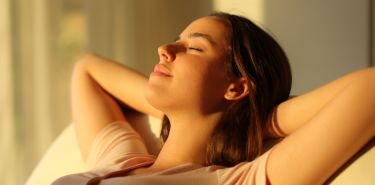 A woman feeling relaxed after a massage