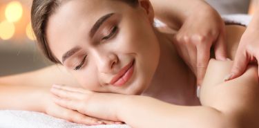 A woman getting a therapeutic Houston Thai massage