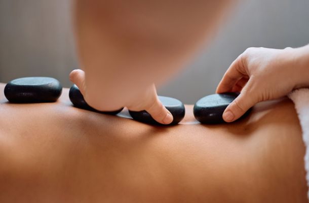 A client getting Houston hot stone therapy