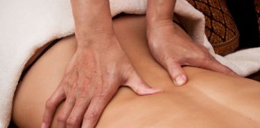 A client getting Houston sciatica massage